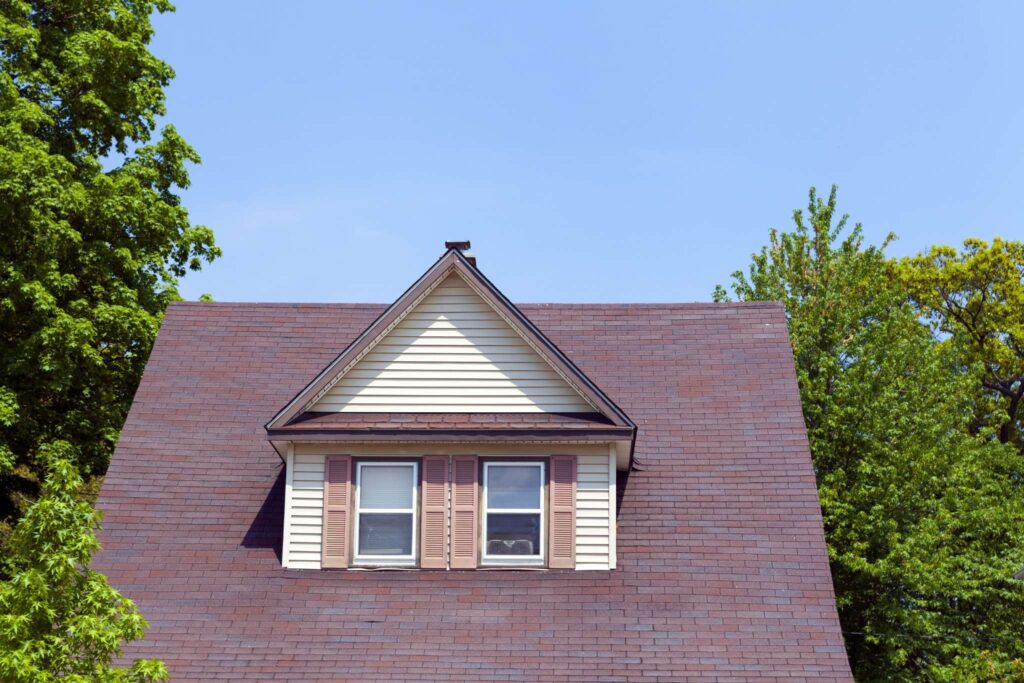 Reliable roofing company working on a home in Wichita KS